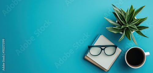 design style eclectic layout concept. A serene workspace featuring a plant, glasses, a notebook, and a coffee cup on a vibrant blue background.