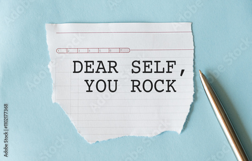 Cuadro en lienzo Torn paper on copy space blue background with text DEAR SELF YOU ROCK, concept o
