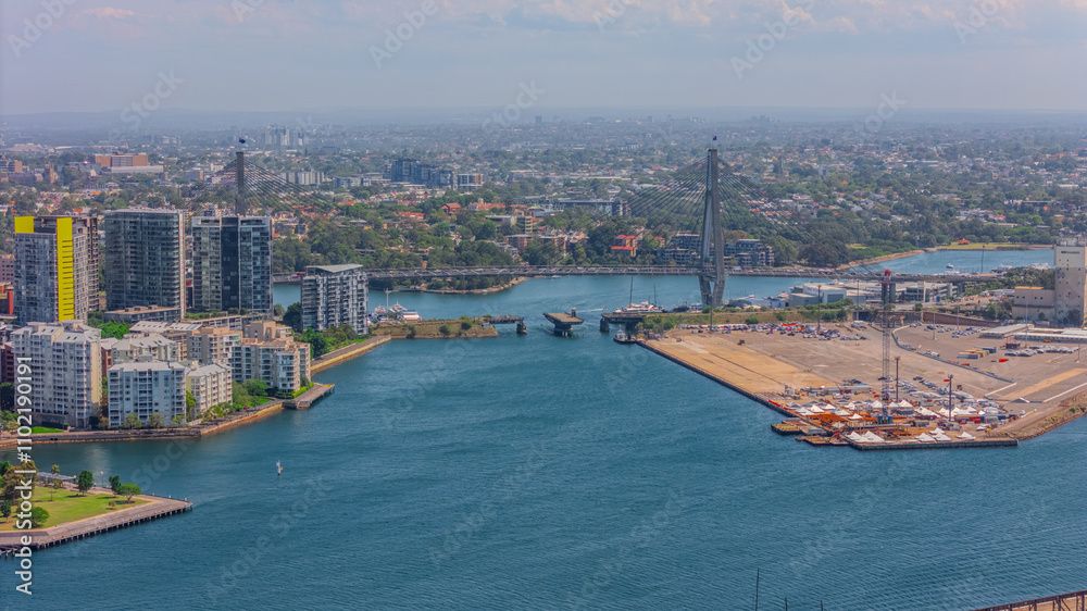 Fototapeta premium Aerial View of Sydney Harbour Balmain Darling harbour Sydney CBD cockle Bay Wharf North Sydney harbour bridge Lavender Bay Milsons Point Manly on a warm summer day blue skies 