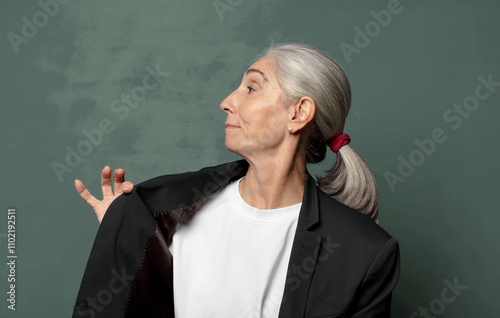  looking arrogant, successful, positive and proud, pointing to self