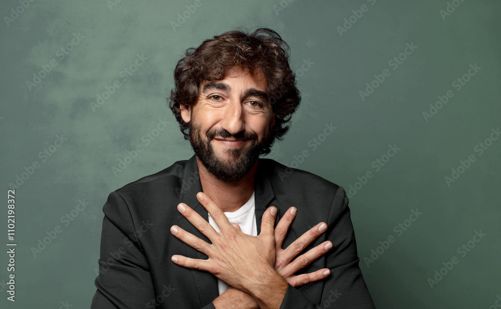 Fototapeta premium feeling romantic, happy and in love, smiling cheerfully and holding hands close to heart