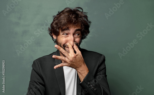  feeling disgusted, holding nose to avoid smelling a foul and unpleasant stench