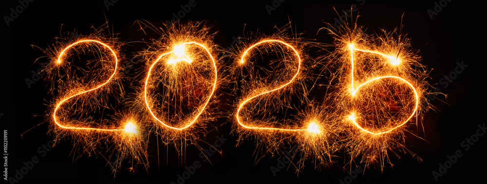 Happy New Year 2025. Burning sparkling text 2025 isolated on black background. Beautiful Glowing design element for greeting card and holiday flyer Happy New Year 2025. Burning sparkling text 2025 isolated on black background. Beautiful Glowing design element for greeting card and holiday flyer
