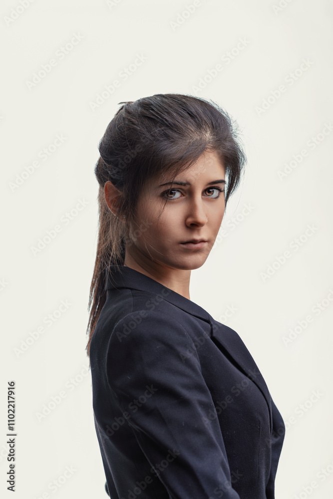 Young professional woman expressing confidence and determination Young professional woman expressing confidence and determination