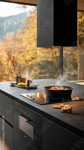 Modern Black Kitchen With Autumnal View And Cooking
