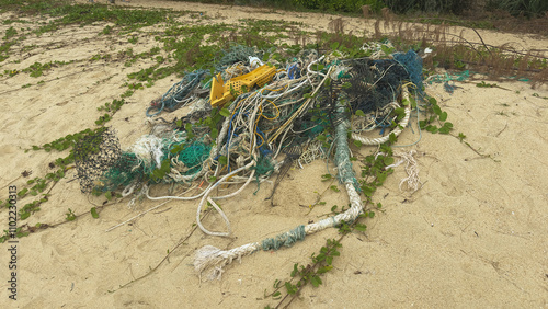 Clump of Plastic Waste Pollution by Beach Shore Coastline