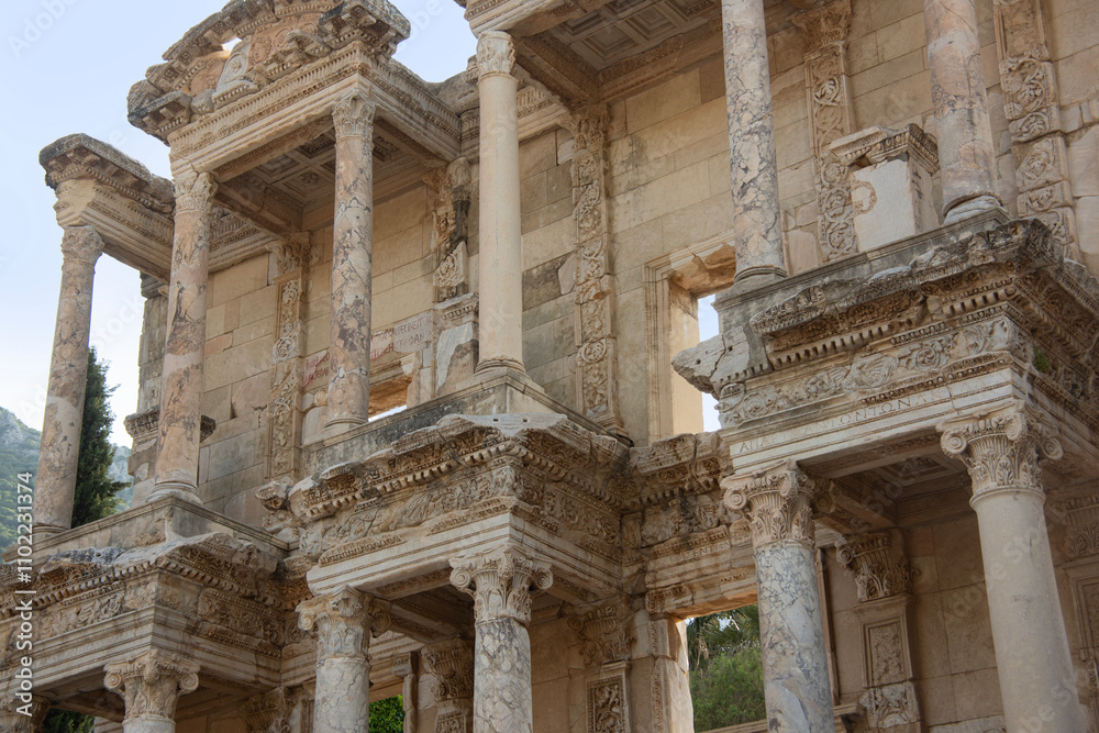 The Library of Celsus, Ephesus. The facade of the Celsus Library in the ancient roman city of Ephesus. Considered an architectural marvel, the building was commissioned around 110 Century BC. The Library of Celsus, Ephesus. The facade of the Celsus Library in the ancient roman city of Ephesus. Considered an architectural marvel, the building was commissioned around 110 Century BC.