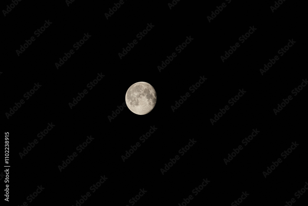 A Stunning Full Moon Illuminates the Clear Night Sky, Creating a Beautiful Atmosphere A Stunning Full Moon Illuminates the Clear Night Sky, Creating a Beautiful Atmosphere