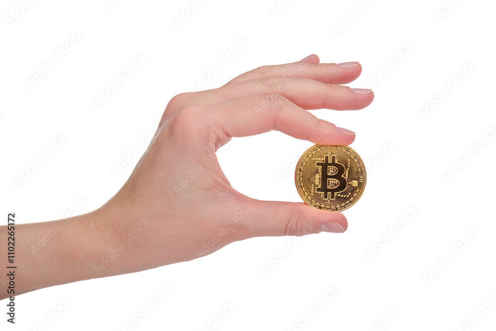 Bitcoin in a female hand on a white background. Female hand holding a bitcoin coin.