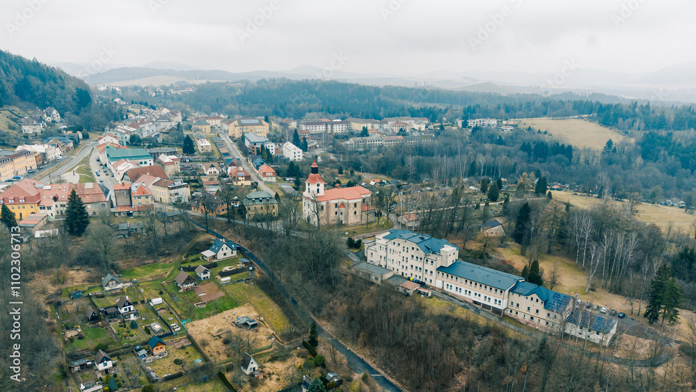 Obraz premium Aerial View of European Village, Houses and Hills. Zacler, Czechia
