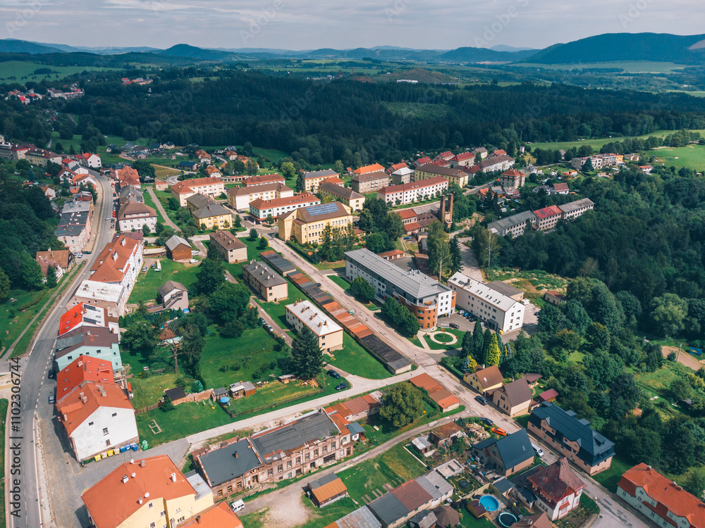Obraz premium Aerial View of European Village, Houses and Hills. Zacler, Czechia