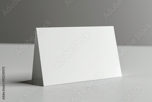 Blank tent card mockup with copy space on grey background
