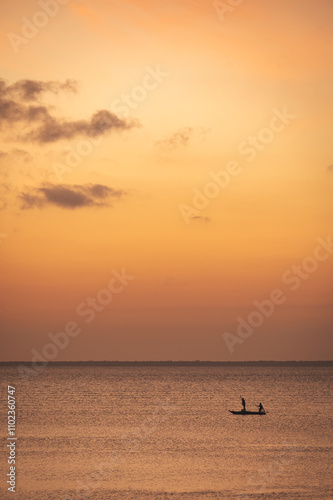 Zanzibar fishermen boats in November sunsets 