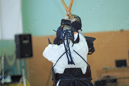 Kendo. The Russian Championship. Athletes in protective gear with swords and a helmet on their heads. High quality photo