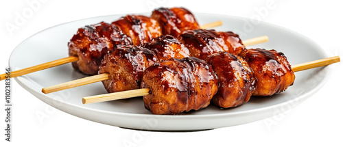Delicious grilled skewers on a white plate. transparent background