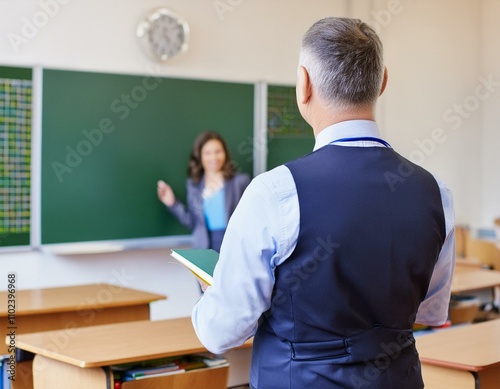 classroom with a teacher; school board; lesson; back to shorin, the concept of education photo