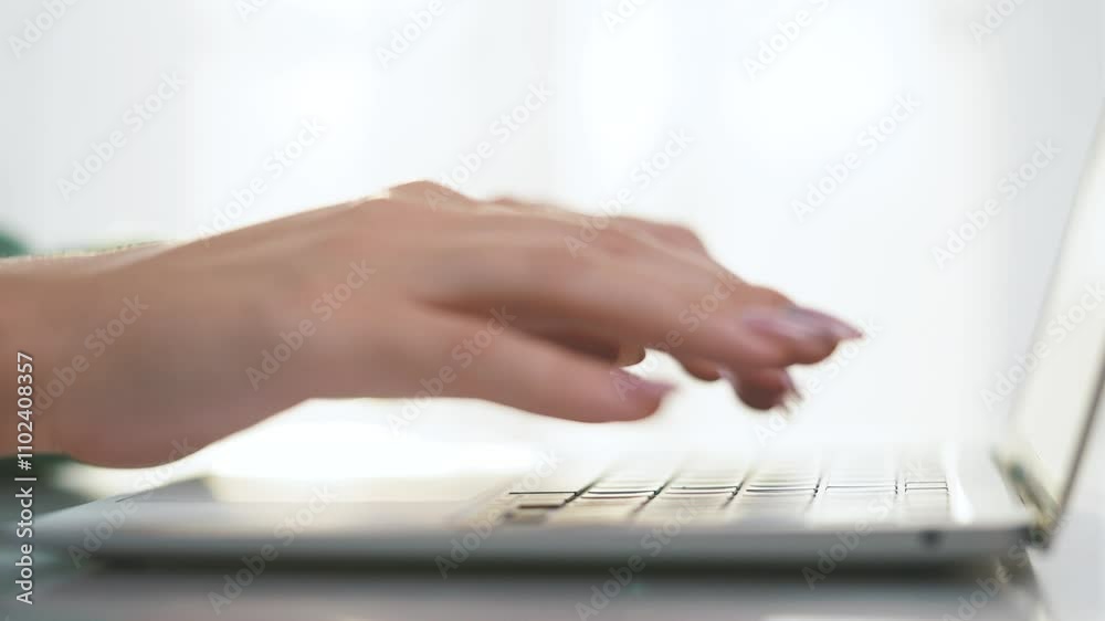 Girl is typing on laptop with her hands. using business young concept. woman is working on her laptop with her hands. a woman works on a laptop, a girl types on keyboard a. Girl is typing on laptop with her hands. using business young concept. woman is working on her laptop with her hands. a woman works on a laptop, a girl types on keyboard a.