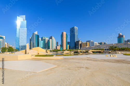 Waterfront cafes and modern architecture and design at the Cultural Foundation Park alongside the Qasr Al Hosn fort in the city center of Abu Dhabi, United Arab Emirates.	 photo