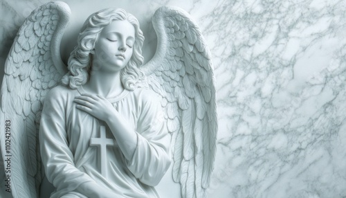 A stunning angel figure carved from marble, featuring graceful wings and a peaceful expression