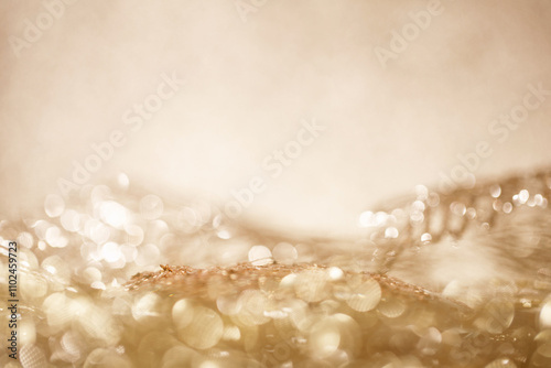 Shiny abstract gold background with round bokeh. Golden color. Christmas background. photo