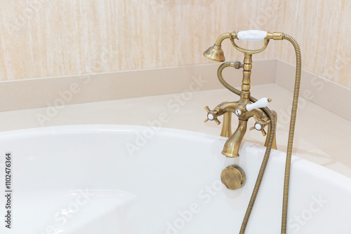 Two-handle shower faucet finished in bronze and white porcelain