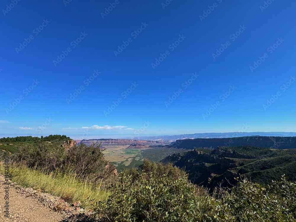 Mesa view red rocks blue sky with clouds Moab Utah Mesa view red rocks blue sky with clouds Moab Utah