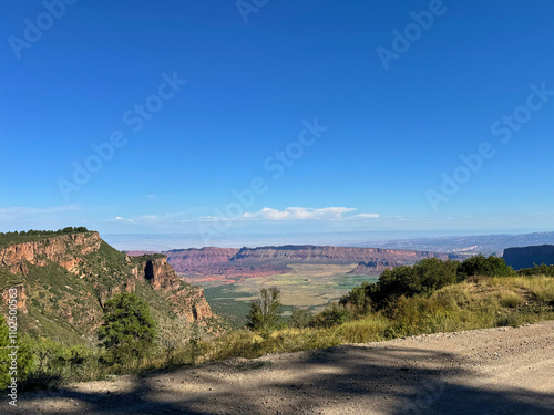 Mesa view red rocks blue sky with clouds Moab Utah