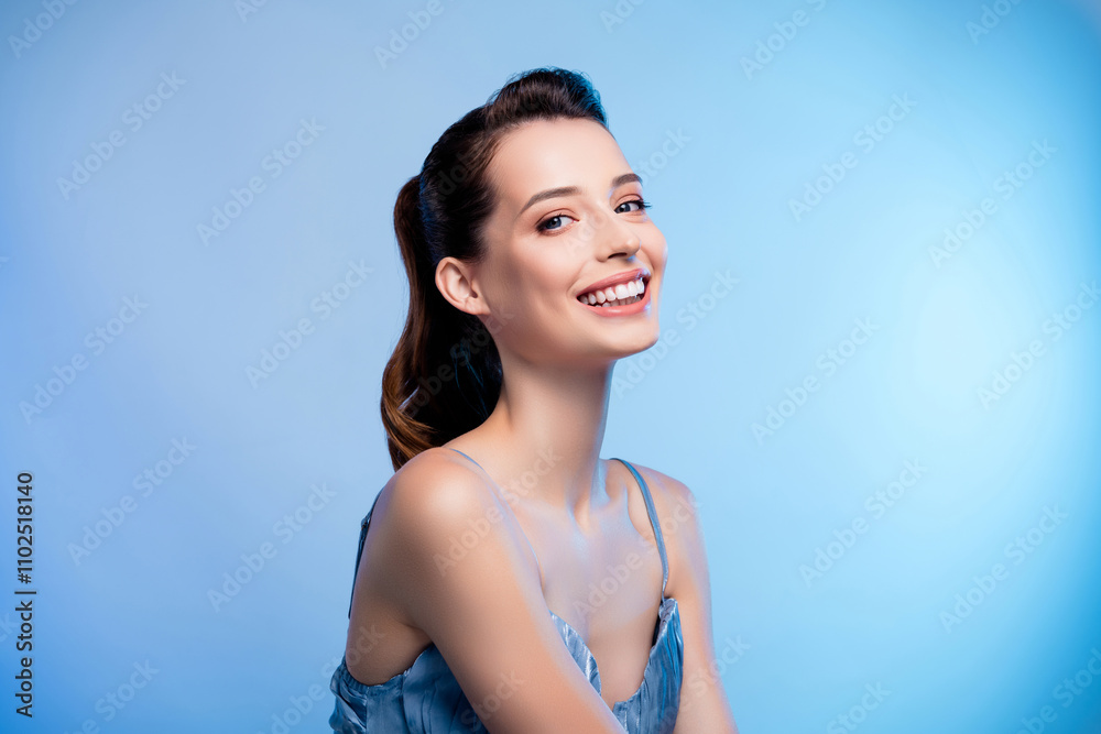 Portrait of tender stunning model woman toothy smile posing empty space isolated on blue color background