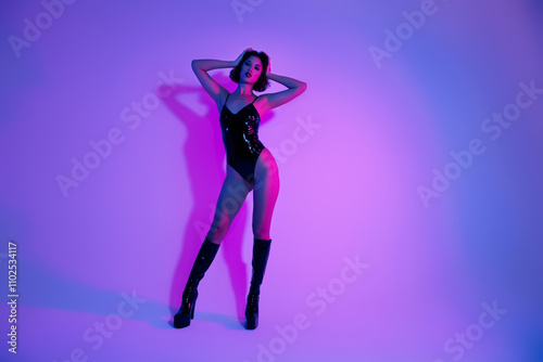 Photo of asian lady touch hair feel elegance tempting wear black leather suit costume in neon background