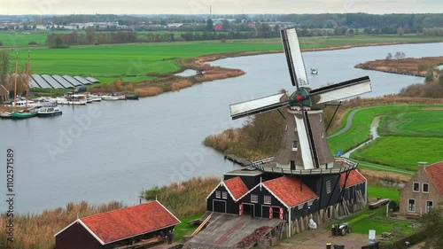 Aerial of traditional Dutch historic wood saw mill in IJlst, Friesland photo