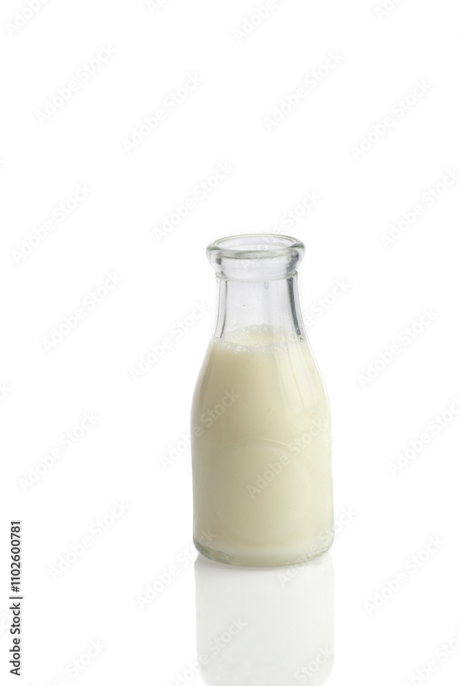 Old fashioned bottle of milk on white background Old fashioned bottle of milk on white background