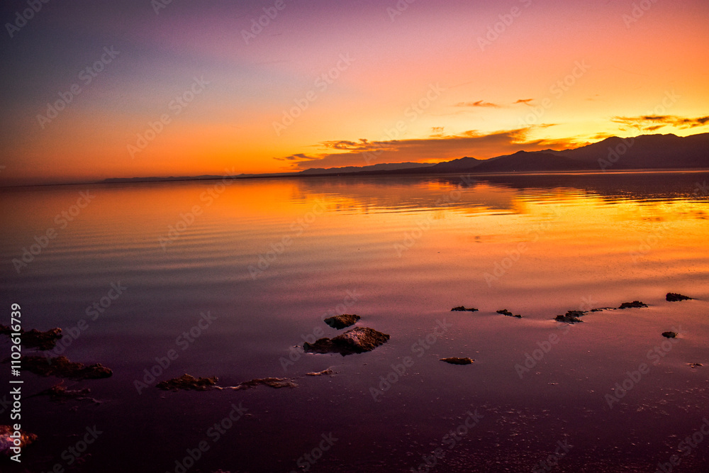 Sunset reflecting on sea, Salton Sea, California Sunset reflecting on sea, Salton Sea, California