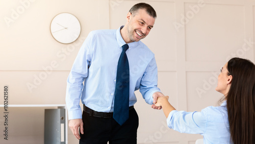 Career And Employment. Mature Man Shaking Hands With HR-Manager Lady On Job Interview In Modern Office. Selective Focus