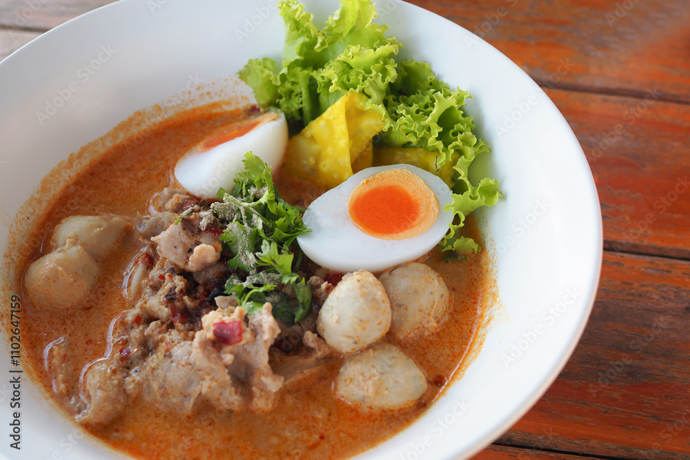 Pork noodle tom yum with condensed water egg. Pork noodle tom yum with condensed water egg.