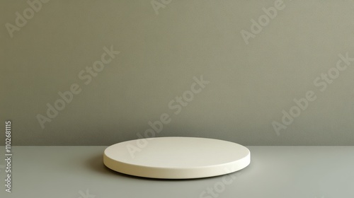 White Circular Platform Against A Green Background