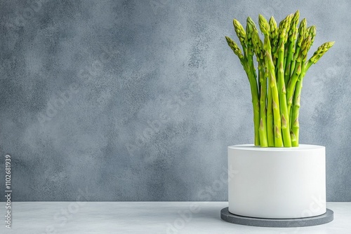 Asparagus tips simplified into geometric shapes, with vibrant green against a white canvas for a striking look photo