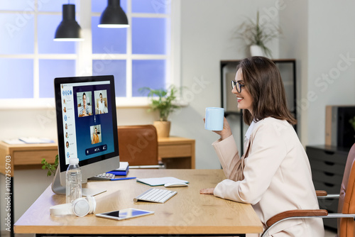 Young businesswoman with co...
