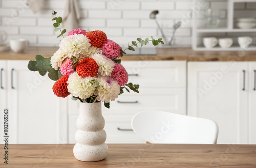 Vase with beautiful dahlia ...
