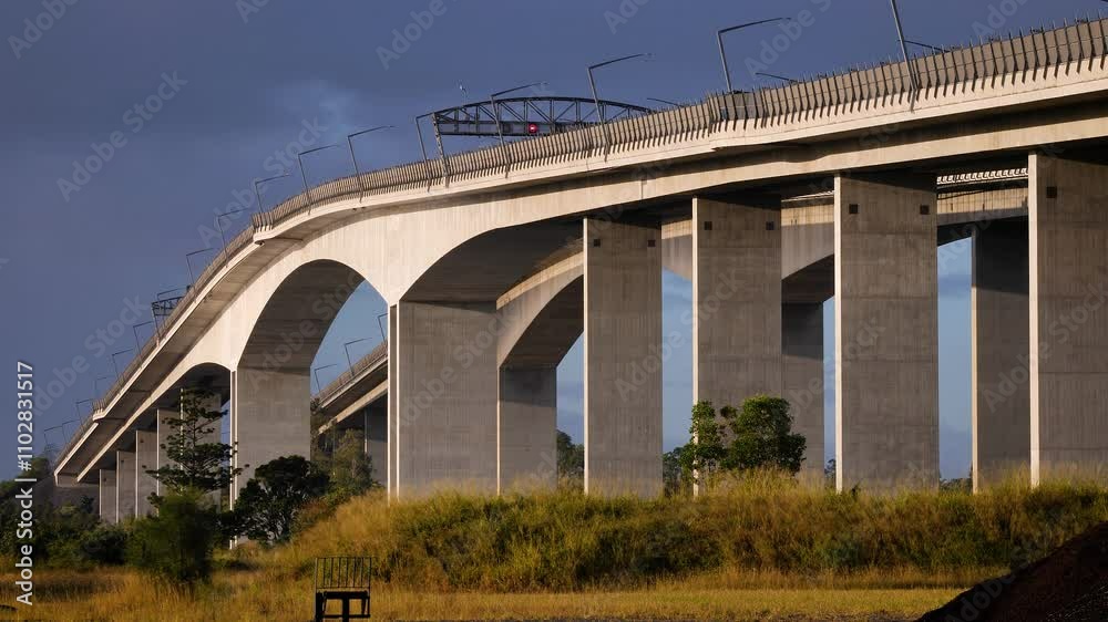 Medium view of the Gateway Bridges under morning sunshine over the Brisbane River from the Northside, Queensland, Australia Medium view of the Gateway Bridges under morning sunshine over the Brisbane River from the Northside, Queensland, Australia