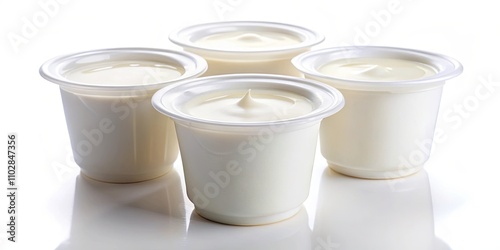 Empty plastic yogurt pots on a white background , plastic, yogurt, pots, empty, white, containers, recycling, food