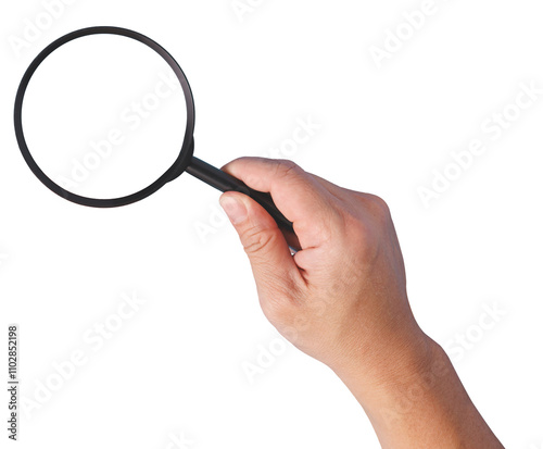 A hand holding a magnifying glass with a transparent magnification lens glass isolated in white background.