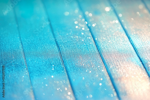 Blue abstract festive background with sparkles and glitter