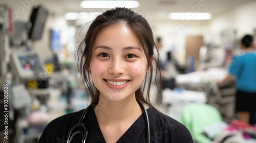 Smiling Female Doctor or Nurse in Hospital Setting