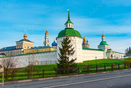 Sergiev Posad. Russia. A fir tree against the background of the Pyatnitskaya Tower and the walls of the Holy Trinity St. Sergius Lavra photo