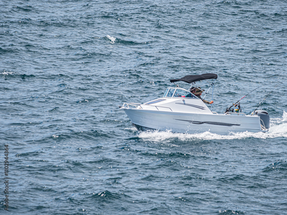 Fototapeta premium Cabin Cruiser Fishing Outside The Heads