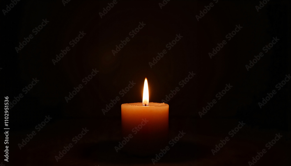 Single burning candle in dark setting Single burning candle in dark setting