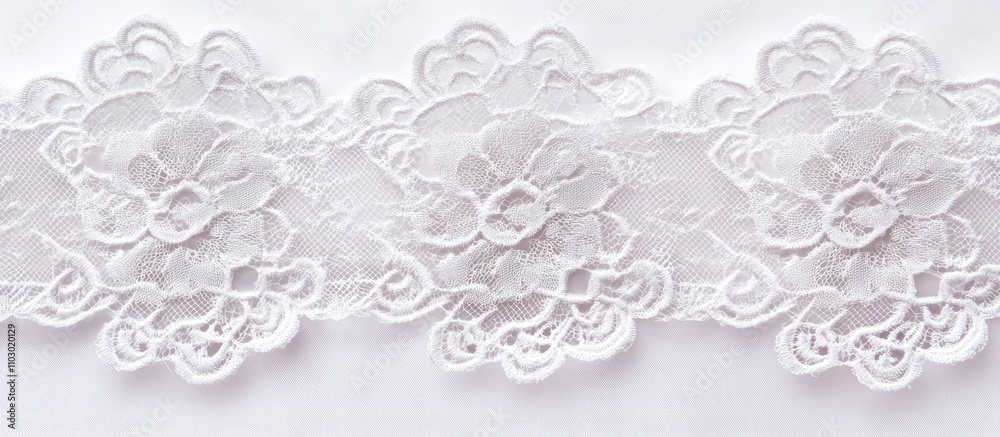 Delicate lace trim featuring floral patterns on a white wedding dress highlighting elegance and craftsmanship in bridal fashion. Delicate lace trim featuring floral patterns on a white wedding dress highlighting elegance and craftsmanship in bridal fashion.