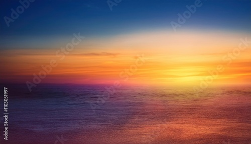 Golden Hour Horizon: A breathtaking sunset paints the sky in vibrant hues of orange, pink, and purple, casting a warm glow on the clouds below. The sun dips below the horizon.