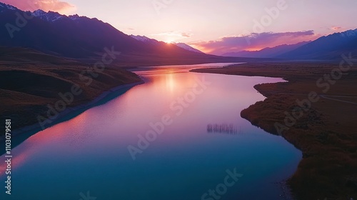 Serene Sunset Over Mountain Lake Reflecting Colors