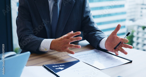 Bilde på lerret Businessman, hands and documents with explanation for proposal, contract or project budget at office